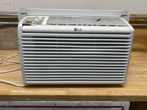 lot 13 image: LG 5000 BTU Window Air Conditioner with Manual Controls (Has some cosmetic damage)