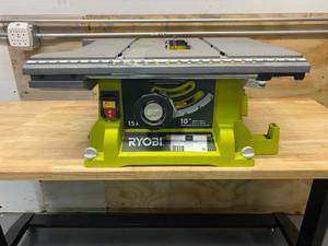 lot 31 image: RYOBI 15 Amp, 10 Table Saw.