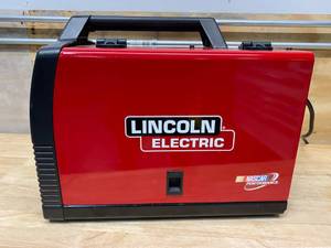 lot 87 image: LINCOLN ELECTRIC 180 Amp Weld-Pak 180 HD MIG Wire Feed Welder with Magnum 100L Gun, Gas Regulator, MIG and Flux-Cored Wire, 230V