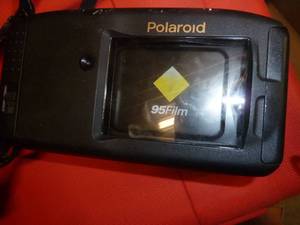 Pentax K1000 Camera, Two Polariod Cameras - 104 and Captiva SLR