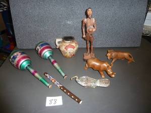 Spanish Carving of a Man, Teak Carved Lion and Rhino, Stone Carved Peacock, Wood Flute, Maracas