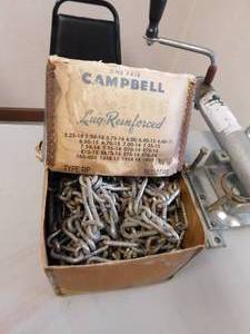 lot 33 image: Pivoting Trailer Jack with wheel & Set of 14 to 16 Tire Chains