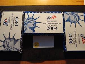 1999, 2004, and 2006 U.S. Mint Sets in original Mint Packages With COAs