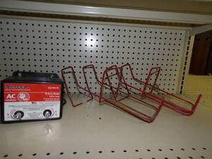 lot 98 image: Electric Fencer and 2 Bottle Holders