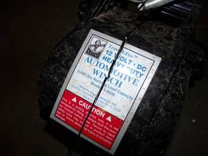 lot 105 image: 6000# 12V Automotive winch with controls
