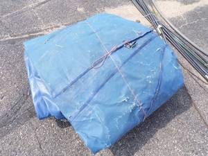 lot 131 image: Large Blue Tarp may have holes good for woodpile