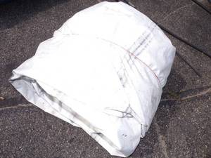 lot 132 image: Large White Tarp may have holes good for woodpile