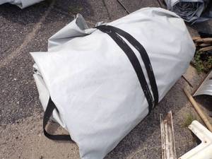 lot 133 image: Large Gray Tarp may have holes good for woodpile