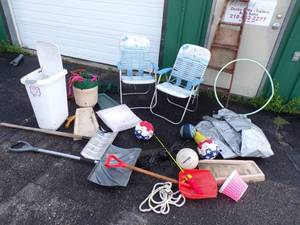 lot 136 image: Folding Chairs, Boot Scrubber, Volleyballs, Rain spout catchers, Step ladder, Planters, Snow shovels and lots more