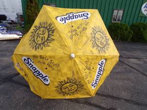 lot 140 image: Snapple Patio Table Umbrella with stand