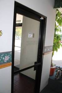 lot 227 image: Commercial 2-Glass Pane Metal Entrance Door with Hardware