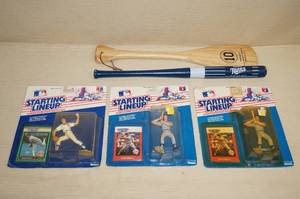 lot 35 image: Twins Starting Lineup Figures and Game Giveaway Bats