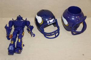 lot 43 image: 2 Vikings Plastic Helmets and Cleatus from Fox Sports