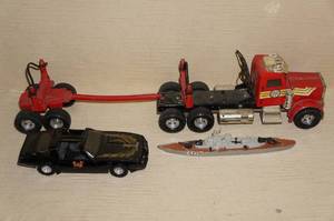lot 87 image: Die-Cast Logging Truck, Car, and Matchbox Ship