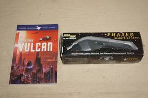 lot 106 image: Star Trek Phaser Remote Control and Book