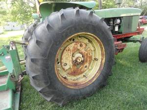1964 - 1965 John Deere 4020 with Farm Hand F235 Loader and bucket