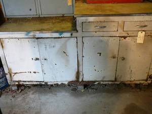 Metal CabinetBench & Red Tool Box