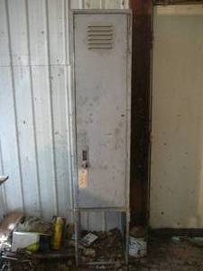 Locker on Stand With Items Inside