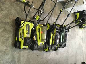 PALLET WITH RYOBI ELECTRIC LAWN MOWERS CUSTOMER RETURNS SEE PICS NOT CHECKED