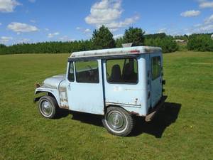 lot 1 image: 1974 AMC Mail Jeep