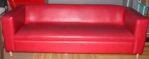 lot 15 image: Retro Red Faux Leather Sofa