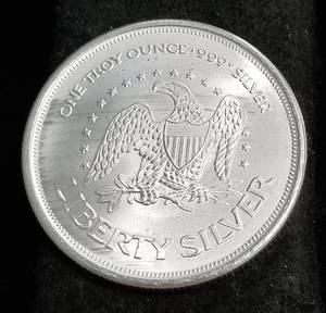 1 TROY OZ. .999 FINE SILVER A-MARK LIBERTY
