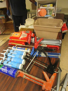 lot 353 image: ASSORTED SHOP SUPPLIES, CAULK GUNS, SPONGES, ELECTRICAL EQUIPMENT, TILE SPACERS, MORE