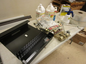 lot 386 image: NORCO HOSE RACK, DOOR KNOBS, MURIATIC ACID, LACQUER THINNER, 4 PLASTIC ROLLS, MORE
