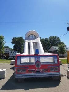 lot 1 image: Inflatable Fire Truck Slide