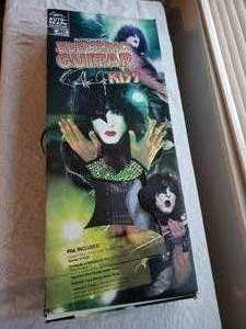 lot 10 image: Paul Stanley KISS Autographed Guitar with COA