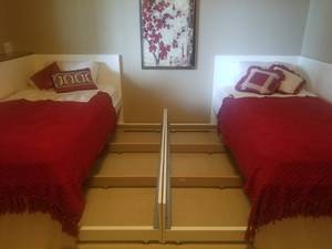 lot 36 image: Ikea White Trundle Bed with Lower Storage