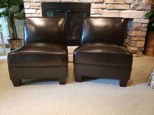lot 24 image: Brown Leather Side Chairs