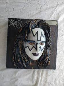 lot 11 image: Collection of 4 Autographed KISS Resin Cast Bust  Certified