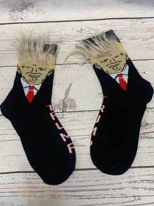 lot 60 image: Trump Black Socks with Realistic Hair