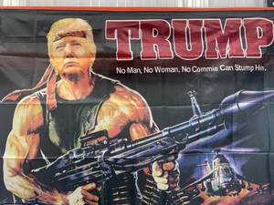 lot 73 image: Trump Rambo Flag  Banner (approx 3x5)