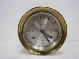lot 23 image: Vintage HOWARD MILLER Brass Porthole Style Clock