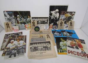 lot 108 image: Collection of Vintage Saint Paul FIGHTING SAINTS Hockey Memorabilia
