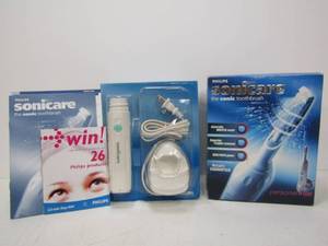 lot 116 image: Brand New SONICAIRE Electric Toothbrush