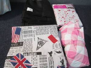 4 Assorted Table Cloths...