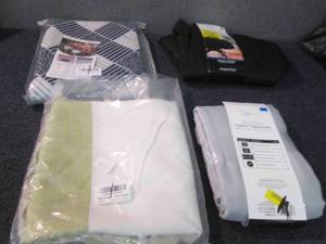 4  Assorted Table Cloths...