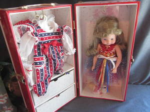 lot 23 image: Lets Play Dolls Trunk, Doll, Outfits