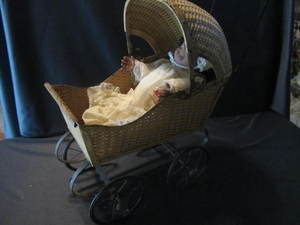 lot 60 image: Antique Doll Buggy
