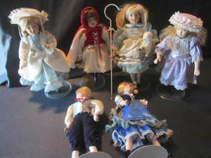 lot 99 image: Fairytale Dolls