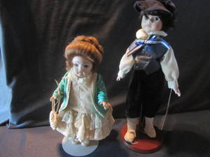 lot 113 image: Two Dolls