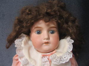lot 210 image: Bisque Doll