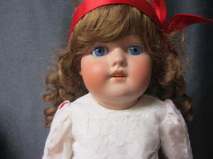 lot 213 image: Bisque Doll