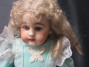lot 218 image: Bisque Doll