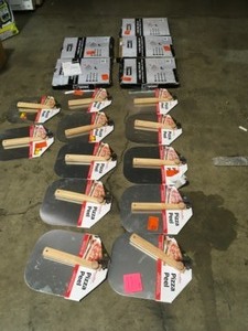 BIN WITH PIZZA PEELS SLICERS CUSTOMER RETURNS SEE PICS