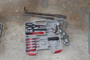 lot 26 image: Piper cutter hand saw and pry bar