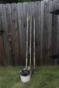 lot 39 image: lot of hockey sticks